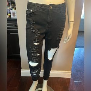 Fashion nova Black ripped jean.